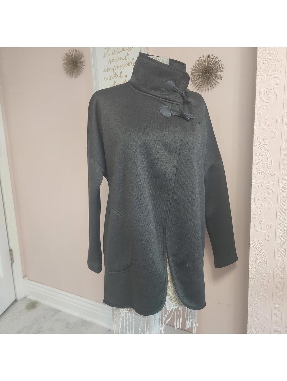 Lolë Arielle dark gray cardigan appears to be the Cardigan Large